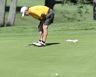 Golfer Albert Pacella of Struthers reacts after watching his putt miss the cup by inches on the 17th hole Saturday afternoon at The Lake Club as part of the Vindy Greatest Golfer tournament on August 24.