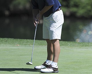 Golfer Joe Meyers follows through on his putt as it makes its way to the hole on the 9th hole Saturday afternoon at Youngstown Country Club as part of the Vindy Greatest Golfer tournament on August 24.