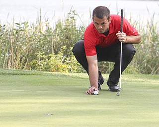 Griffin Todd lines up his putt on the seventh hole of The Lake Club in Poland during the Greatest Golfer of the Valley tournament on Sunday.  Dustin Livesay  |  The Vindicator  8/25/13 Poland.