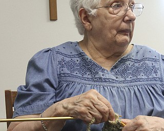 Lucille Stewart of Canfield participates in the Ursuline Sisters’ Prayer Shawl Ministry. Since the group’s formation in 2008, more than 700 handmade prayer shawls stitched by 30-odd members have been distributed to the Ursuline Sisters’ HIV/AIDS Ministry and the Hope Cancer Center, among other organizations.