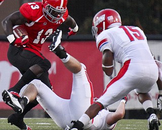William D Lewis The Vindicator YSU's Adaris Bellamy(13) scampers for yardage during 1rst half action agaisnt Dayton Thursday 8-28-13.