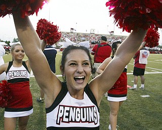 William D Lewis The Vindicator YSU cheerleader Sarah Perry shows her team spirit during YSU opener Thursday with Dayton.