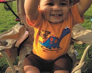 11-month-old TJ Pixley rooted for his big brother, Joel Cuevas, during a Flag Football game this summer. Sent by Betty Cuevas of Boardman, their grandmother.