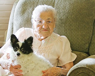 Rose Cifalde turns 110 years old today. Aside from good genes, Rose explained that her longevity is the result of hard work. With her is Zero, her constant companion.