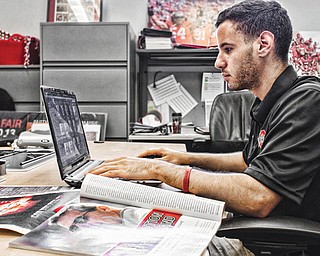 Liberty High and Ohio State graduate Sam Silverman works in his office in the Woody Hayes Athletic Center in Columbus.