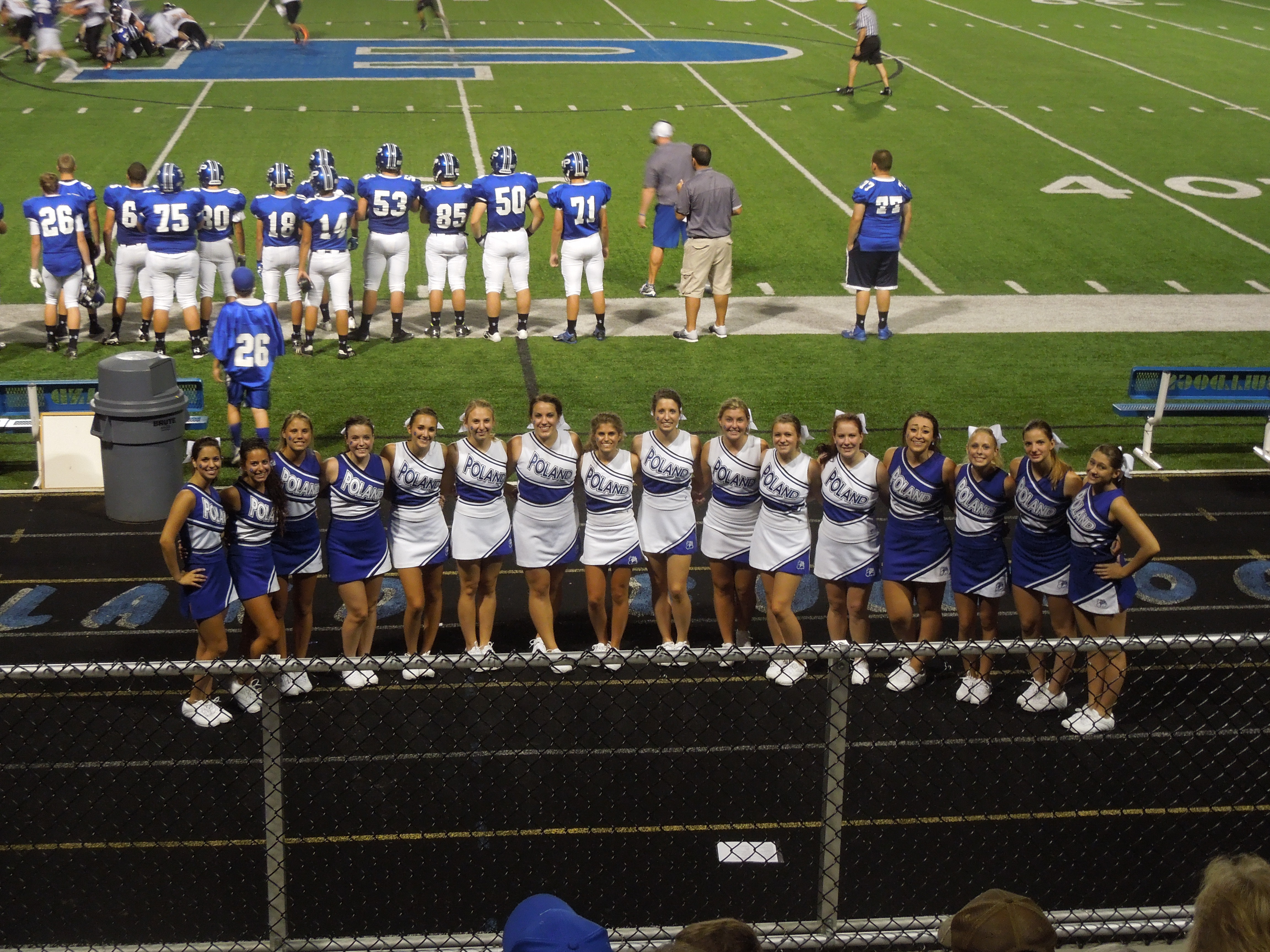 Poland Varsity and Junior Varsity cheerleaders are all smiles as they cheer their Bulldogs onto a victory against Marlington at the home opener.