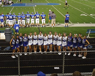 Poland Varsity and Junior Varsity cheerleaders are all smiles as they cheer their Bulldogs onto a victory against Marlington at the home opener.