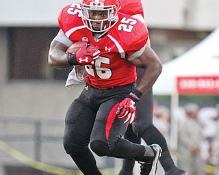 YSU’s Torrian Pace (25) looks for room to run during first-half action last Thursday against Dayton.