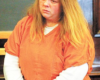 Shain Widdersheim waits Wednesday to hear her sentence from Judge R. Scott Krichbaum after she pleaded
guilty to charges she failed to protect her three sons from abuse from her ex-boyfriend.