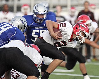 William D LEwis The Vindicator Girard's Nick Cardiero(2) is brought down by Hubbard's Matt JKones(79) andDrew Bencetic(59) during 1rst qtr action at Hubbard 9-5-13.