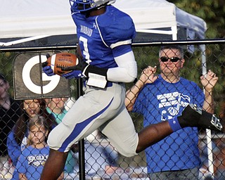 William DLewis The Vindicator Hubbard's LJ Scott(3) scores during 1rst qtr action against Girard 9-6-13 at hubbard.