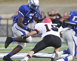 William DLewis The Vindicator  Hubbard's LJ Scott(3) eludes Girard's Vincent Maderitz (18) during 1rst qtr action against Girard 9-6-13 at hubbard.