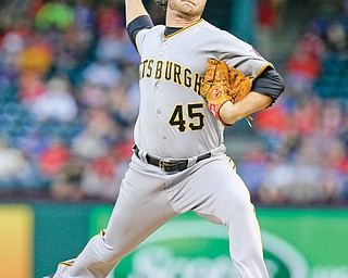 Pittsburgh Pirates starting pitcher Gerrit Cole throws a pitch in the first inning of a game Monday against the Texas Rangers in Arlington, Texas.
