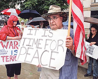 Ray Nakely,of Youngstown and a member of the Coalition for Peace in the Middle East was part of a group protesting possible US military involvement in Syria. The protest was held in downtown Y-town Monday at 7pm.