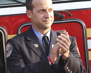 William D. Lewis The Vindicator Nick Mincone a New York City firefighter spoke during 9-11 ceremony in Austintown Wed.