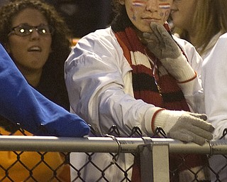 Kelli Cardinal/The Vindicator .Springfield senior Mackenzie (ok) Groner watches the Tigers kick the extra point Friday night during the second quarter against Lowellville at Springfield High School.