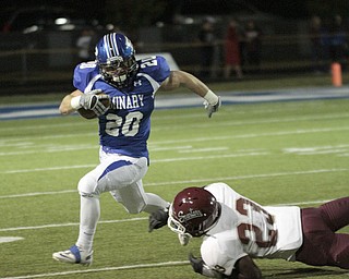  .          ROBERT  K. YOSAY | THE VINDICATOR..Polands #20 Ross Gould Breaks around BDM #23 Dawan Britt as he goes for 20+ yards during third quarter action before being run out of bounds.Boardman Spartans at Poland Bulldogs Stadium