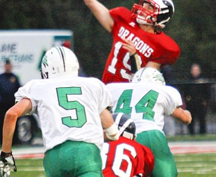 MADELYN P. HASTINGS I THE VINDICATOR..Niles Kyle Paden (19) throws the ball during their game against West branch on September 13.