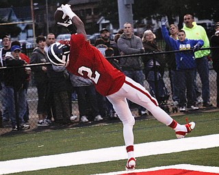 MADELYN P. HASTINGS I THE VINDICATOR..Niles Marcus Hill (2) scores a touchdown during their game against West branch on September 13.