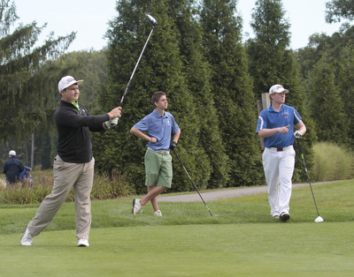        ROBERT K. YOSAY  | THE VINDICATOR..Killing the drive on 18 is Vince Hynes of Lowellville a senior .. watching is  Chance Proverbs 10thgrader from Jackson Milton ( green shorts)  and Noland Snyder a junior from Western Reserve ITCL boys golf tournament--  Pine Lakes Golf Club, Hubbard.. - -30-..