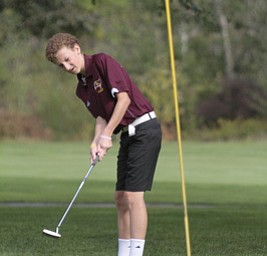        ROBERT K. YOSAY  | THE VINDICATOR..Easy putt on 7 as  Brook Thomas a 10th grader from South Range..ITCL boys golf tournament--  Pine Lakes Golf Club, Hubbard.. - -30-..