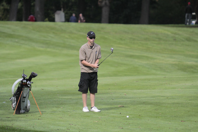        ROBERT K. YOSAY  | THE VINDICATOR..Lineing up his chip is Phil Gerner from East Palestine a junior ..ITCL boys golf tournament--  Pine Lakes Golf Club, Hubbard.. - -30-..