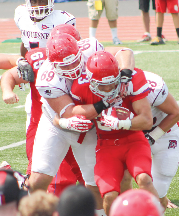 For the first time in school history, Youngstown State will take on the Dukes of Duquesne University — its nearest FCS neighbor — which boasts two Valley natives on the roster: Poland’s E.J. Kosec and Boardman’s Zach
Zidian (69), above.