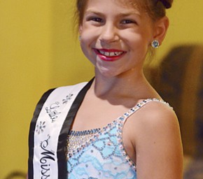 Isabella Rexroad, 7, is the Little Miss Majorette of America. She said shes likes being able to perform big tricks and trying her best.  Photo by Nick Mays | The Vindicator