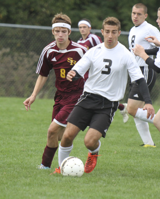 William D Lewis The Vindicator  SR's Cole Durina(8) and Crestview'sTony Marr(3) during Monday action at Crestview.