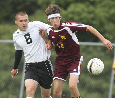 William D Lewis The Vindicator  SR's Jonah Wilson(13) and Crestview'sGreg Bable(8) during Monday action at Crestview.