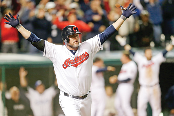 Cleveland Indians’ Jason Giambi reacts after hitting a two-RBI home run off Chicago White Sox relief pitcher Addison Reed in the ninth inning of a game Tuesday in Cleveland. The Indians won 5-4.