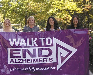 SPECIAL TO THE VINDICATOR
Making plans for the upcoming Boardman Walk to End Alzheimer’s are, from left, Katie Rusu of Ivy Woods Manor; Helen Paes of the Alzheimer’s Association; Jess Briganti, weather anchor at WFMJ-TV and honorary chair; and Alison Alvino of Maxim Healthcare.