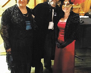 SPECIAL TO THE VINDICATOR
Trying out their costumes in preparation for the Masquerade at the Mill set for Oct. 12 at Lanterman’s Mill are committee members who are planning the event. From left are Maureen Drummond, HandsOn Volunteer Network; and Ray Novotny and April Stanislaw, Mill Creek MetroParks.