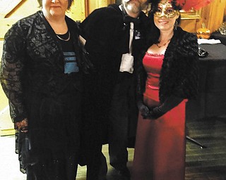 SPECIAL TO THE VINDICATOR
Trying out their costumes in preparation for the Masquerade at the Mill set for Oct. 12 at Lanterman’s Mill are committee members who are planning the event. From left are Maureen Drummond, HandsOn Volunteer Network; and Ray Novotny and April Stanislaw, Mill Creek MetroParks.