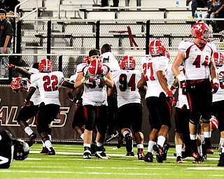 Southern Illinois' MyCole Pruitt sits injured on the field after a late-game fumble that solidified the win for Youngstown State during the second half of the Salukis' 28-27 loss to the Penguins at Saluki Stadium on Saturday, Sept. 28, 2013, in Carbondale, Ill. (Paul Newton / The Southern)