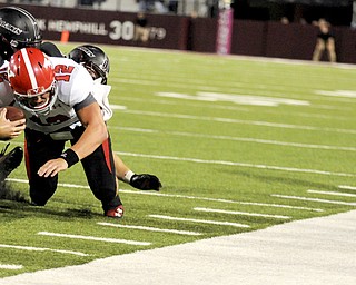 Youngstown State's Kurt Hess reaches out for a first down on a fourth-down run late in the game during the second half of the Salukis' 28-27 loss to the Penguins at Saluki Stadium on Saturday, Sept. 28, 2013, in Carbondale, Ill. (Paul Newton / The Southern)