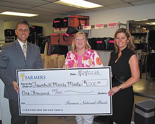 SPECIAL TO THE VINDICATOR
Trumbull Mobile Meals recently received a donation of $1,000 from Farmers National Bank for the Basket Extravaganza that will take place Nov. 9 at W.D. Packard Music Hall, 1703 Mahoning Ave. NW, Warren. From left are Philip Lammers, investment adviser representative for Farmers National Bank; Sandra L. Mathews, chief executive officer of Trumbull Mobile Meals; and Kerry Pizzulo, Farmers National Bank, Niles branch manager. The event will feature themed baskets and items to win, food and entertainment. It will benefit those in the community who face hunger and those who are limited in mobility.
