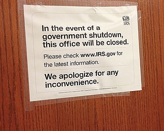 Signs were posted at the Internal Revenue Service office inside the Youngstown federal building Tuesday.