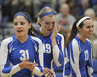 William D Lewis The Vindicator Jax Milton Erica Hughes(19) reacts after scoring her 1,500 career kill during Wed 1--02-13 game with Western Reserve. she is flankedby teamatesTaylor Tharp(31) and Madison Tomaino(17).