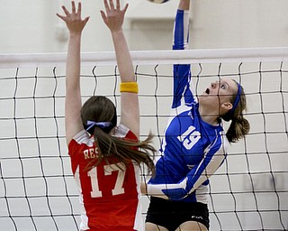 William D Lewis The Vindicator Jax Milton Erica Hughes(19) scores her 1,500 career kill during Wed 1--02-13 game with Western Reserve. Defending for WR is Katie Miggo(17).