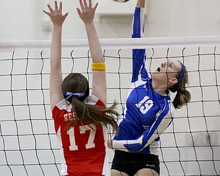 William D Lewis The Vindicator Jax Milton Erica Hughes(19) scores her 1,500 career kill during Wed 1--02-13 game with Western Reserve. Defending for WR is Katie Miggo(17).
