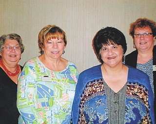 SPECIAL TO THE VINDICATOR
Mill Creek Chapter of the American Business Women’s Association installed officers at a recent meeting at Beard Cabin in Boardman Park. From left are Kathy Anderson, treasurer; Marilyn Abramski, secretary; Bonnie Pannunzio, vice president; and Mary Brown, president. Officers will preside until July 2014. The president will represent the club at the National Convention in Little Rock, Ark., this fall.