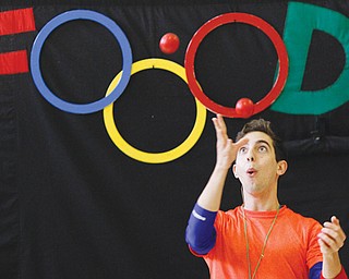 Carlos Leon is part of FoodPlay Productions, based in Massachusetts, which performed at Martin Luther King Elementary School in Youngstown on Wednesday for kindergartners through second-graders — teaching students about healthy vs. unhealthy food choices with juggling, magic, games and songs.