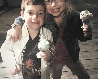 Grandchildren Evan and Hannah Straub are all smiles while enjoying ice cream on the boardwalk in Kennebunkport, Maine. Sent by Chuck Straub of Salem.