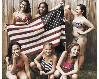 In front are Courtney Gulu, Bailey Marinelli and Zoe Bailey and in back are Mackie Sandquist, Suhad Albaat, Ross Bailey and Kayla Gulu, all enjoying a summer pool party. Taken by Russ Bailey of Austintown.
