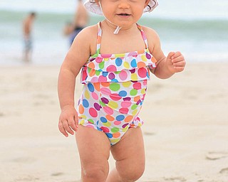 Nina Armeni is taking a walk in the sand at Bethany Beach, Delaware. Taken by Aunt Joyce Buzzacco.