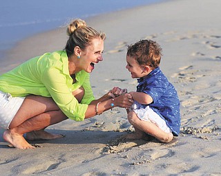 Samantha Manning is having fun with her son Sam at Bethany Beach, Delaware. Taken by Joyce Buzzacco.