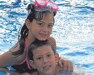 Trystin and Chase Nelson having fun in Grandma and Pap's pool. Sent by Kathy Mackall of Columbiana.