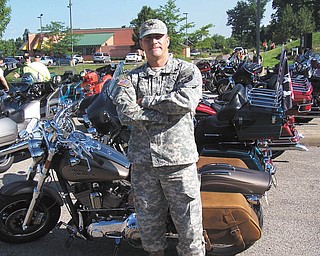 Sgt Gunn, of Meadville, Pa., now serving in San Diego, Calif., escorted the Vietnam Moving Wall from Warren, Ohio to Hermitage, Pa. in August 2012. It was not an assignment, he volunteered to join more than 800 motorcycles. Sent by Kelly L. Morocco.