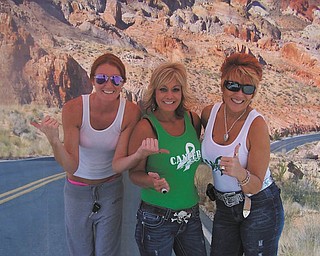 Three friends, Dana Marucci, Jill Fonner and Kelly L. Morocco, participate in Fun on the Road, Hitchin a ride for Charity for Clark House, Valley View Road, Clark, Pa.